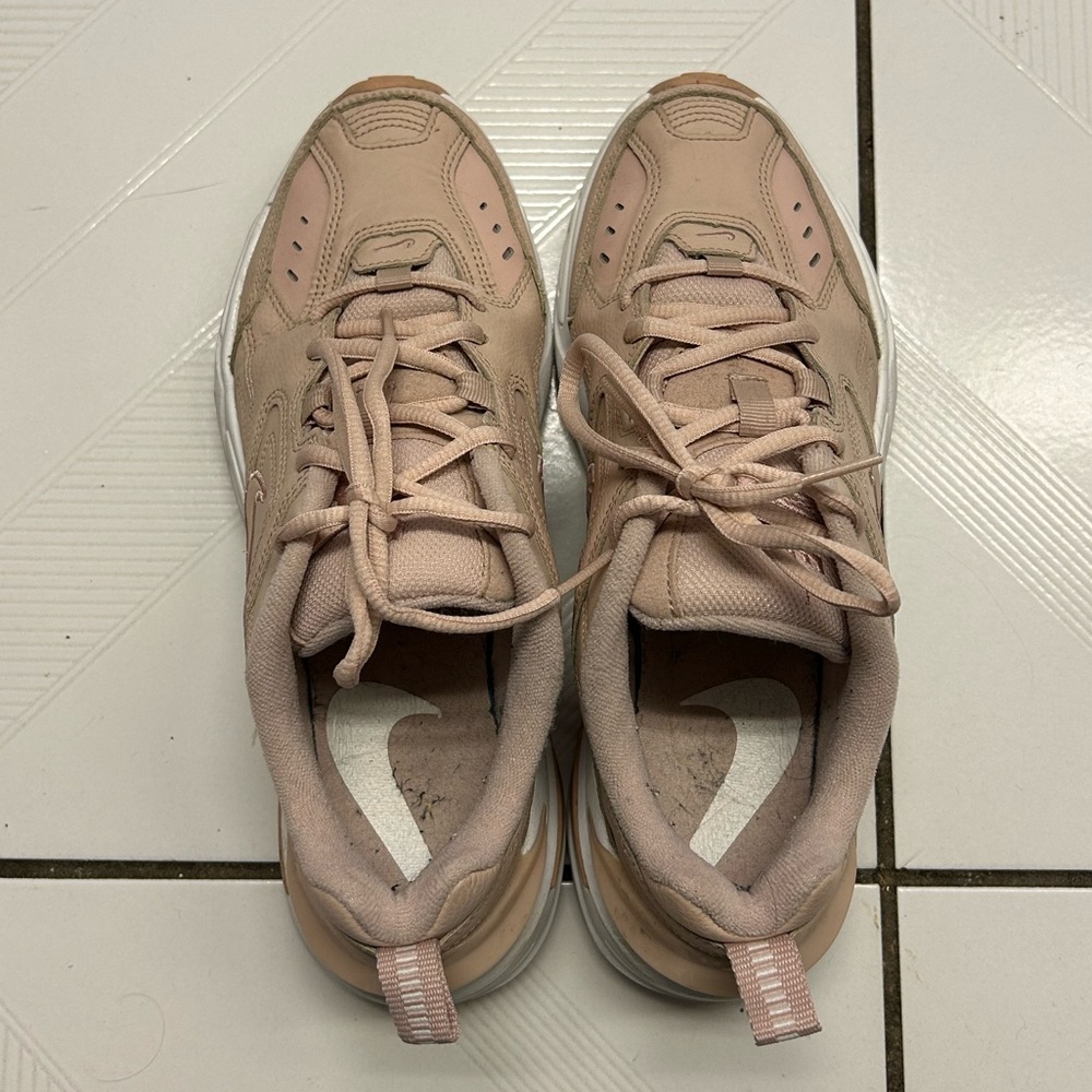 Blush Nike dad sneakers